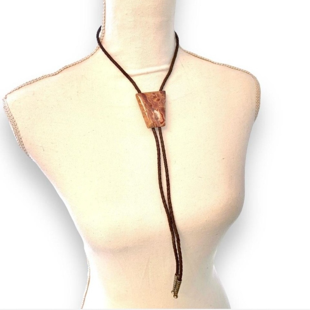 Rare Native America  Hand Crafted and Polished Rhyolite Stone Bolo Tie